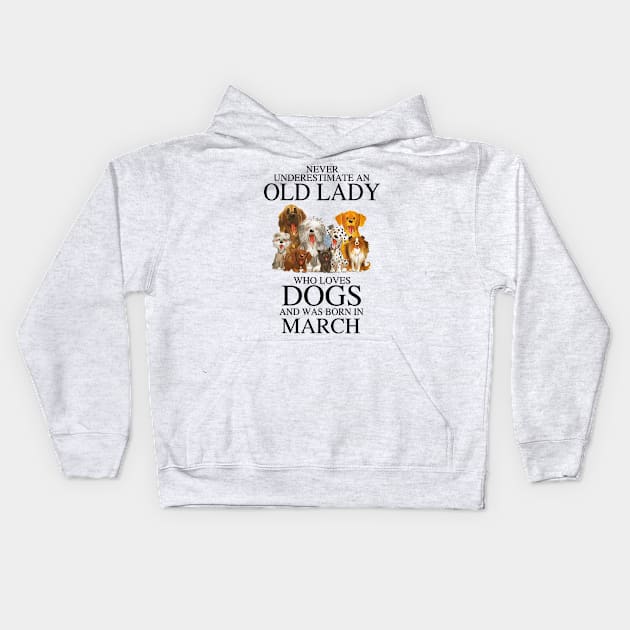 Never Underestimate An Old Lady Who Loves Dogs And Was Born In March Kids Hoodie by louismcfarland